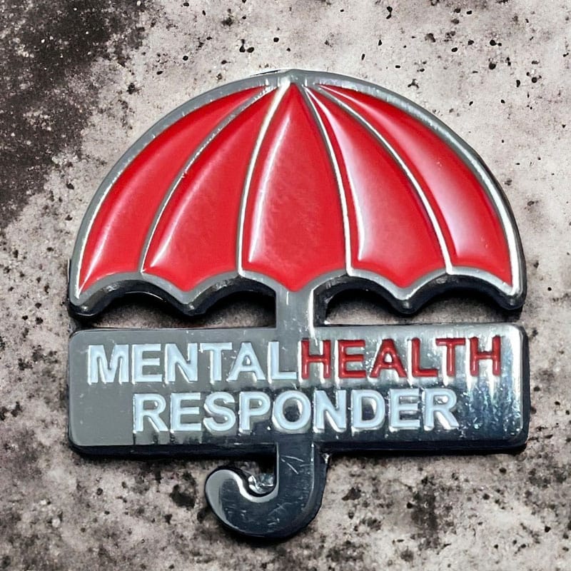 photo of Red Umbrella bespoke pin badge